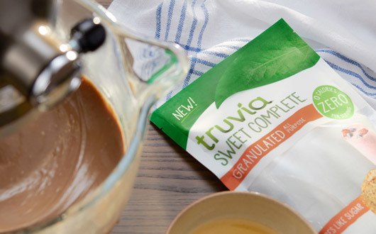 Truvia Sweet Complete All-Purpose Sweetener on kitchen counter next to mixer